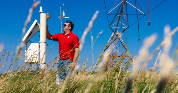 The solar flares that generated auroras in Nebraska May 10-11 this year also produced electromagnetic interference that distorted sensor readings for soil moisture and hydrology monitoring. UNL now prevents that disruption after installing a neutron monitor. The device will be a major help for agricultural practices, irrigation management and climate monitoring. (Craig Chandler/University Communication and Marketing)